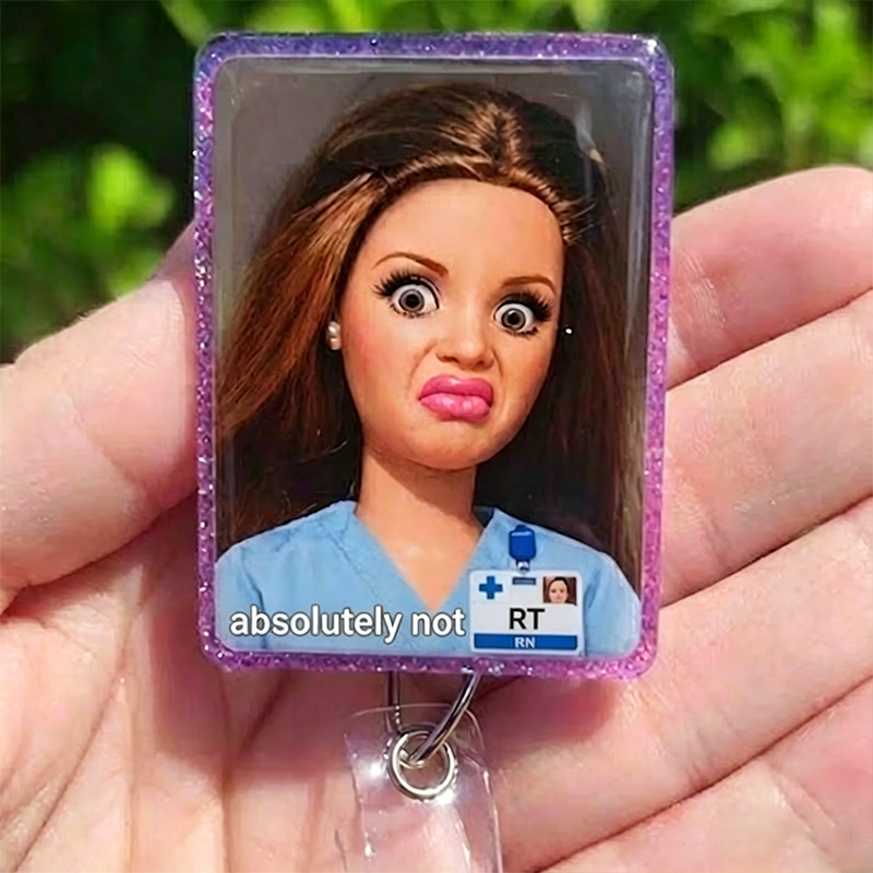 RT Funny Doll Face Meme Badge Reel