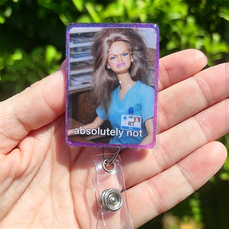 RT Funny Doll Face Meme Badge Reel