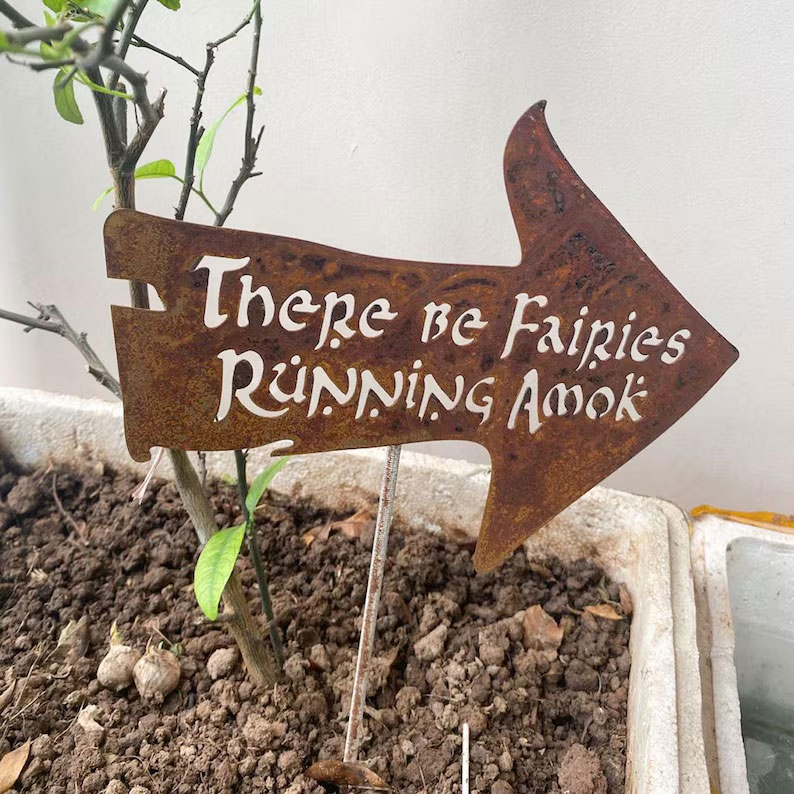 There Be Fairies Running Amok Sign
