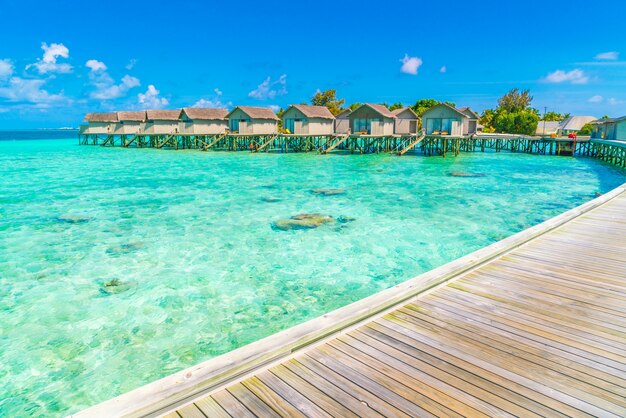Free photo beautiful water villas in tropical maldives island  .