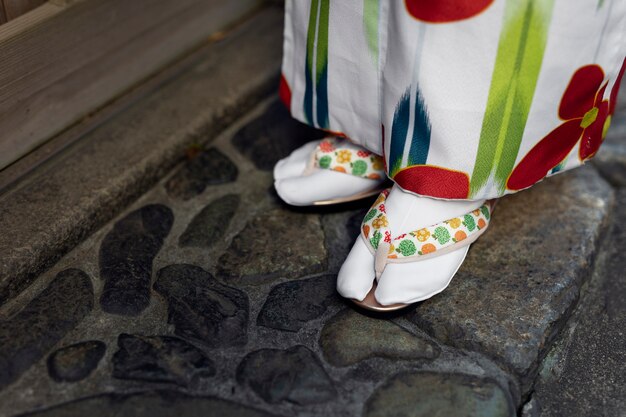 Free photo woman wearing beautiful japanese kimonos and obi