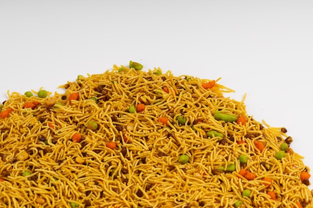 Photo mixture commonly known as chivda or namkeen is a popular and delicious savory snack in india a mixture of various crunchy and flavorful ingredients