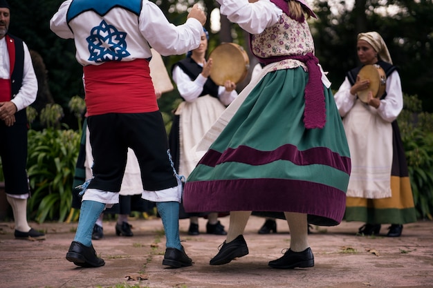 Free photo back view people dancing folk