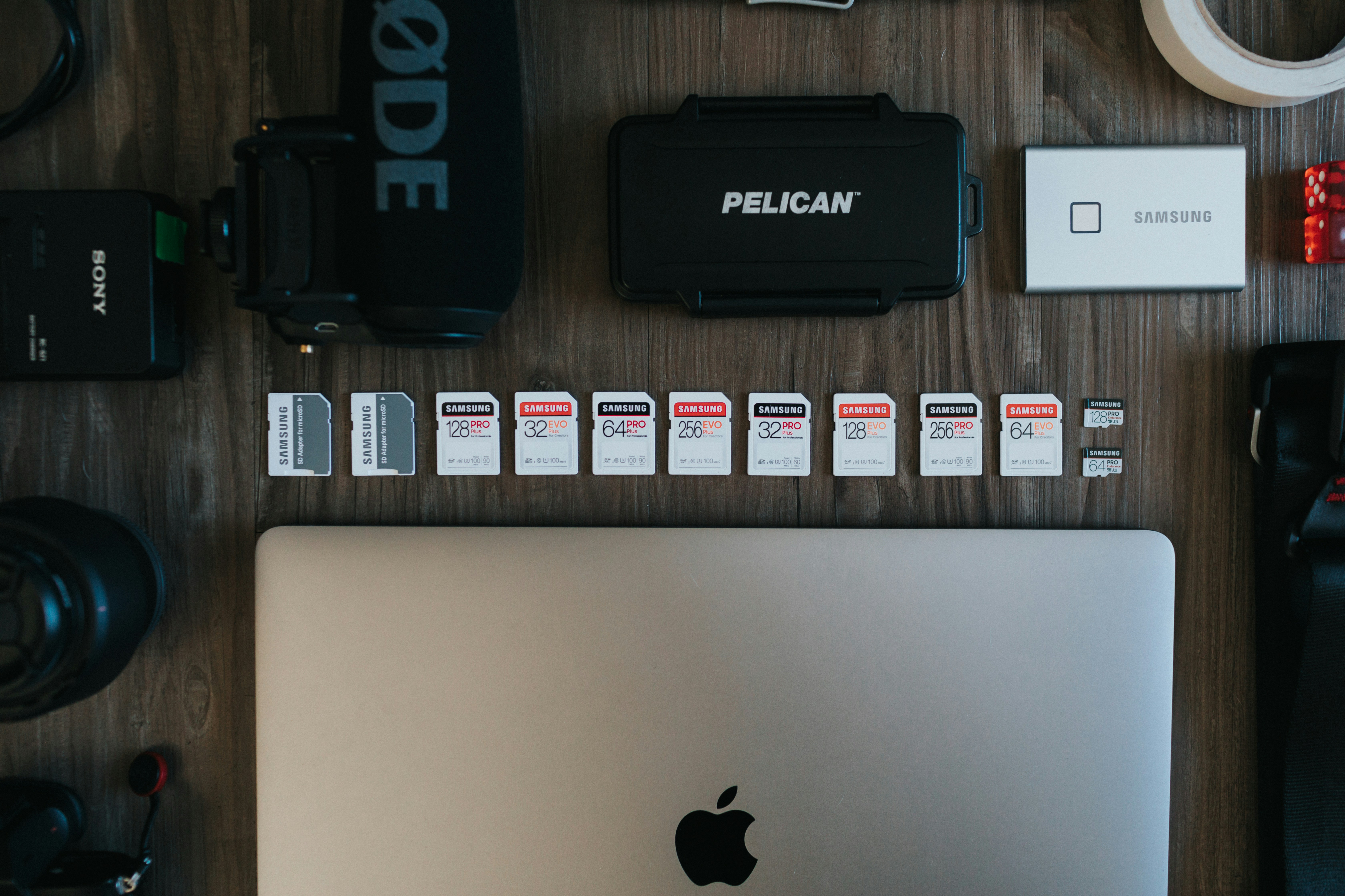 Portable electronic device placed next to a laptop