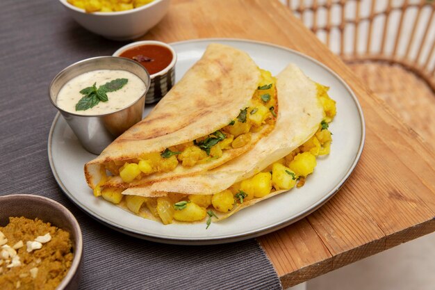 Free photo delicious indian dosa composition
