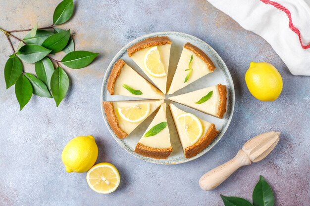 Free photo homemade newyork cheesecake with lemon and mint,healthy organic dessert,top view