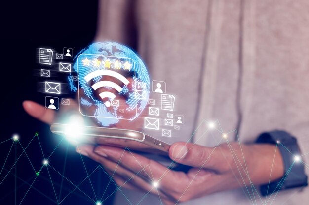 Photo technologie internet sans fil wi-fi pour la commodité dans la vie quotidienne, le concept d'internet sans fil fournit un signal de réseau wifi gratuit. avec icône wifi, concept de réseau social, communication d'affaires, avec vitesse