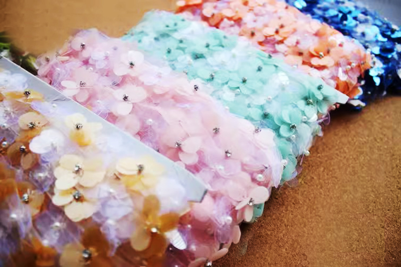 shiny plastic-like fabric used for buttons blouses and furnishings