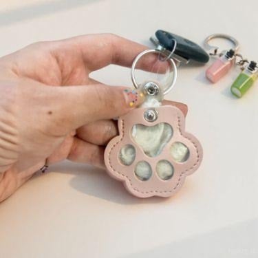 🔥HOT SALE 49% OFF - 🐾Pet Paw Shaped Leather Keychain