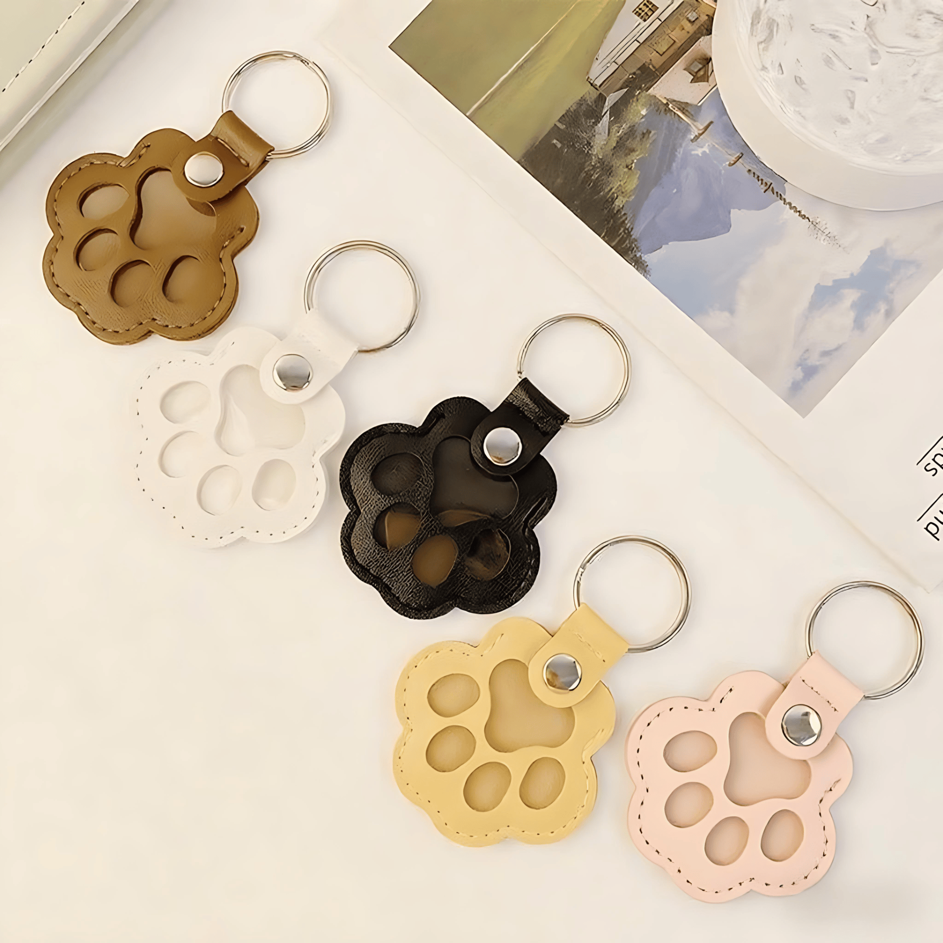 🔥HOT SALE 49% OFF - 🐾Pet Paw Shaped Leather Keychain
