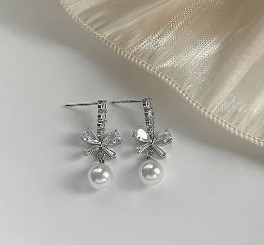 🎄Christmas Hot Sale✨Shiny Bow Pearl Earrings