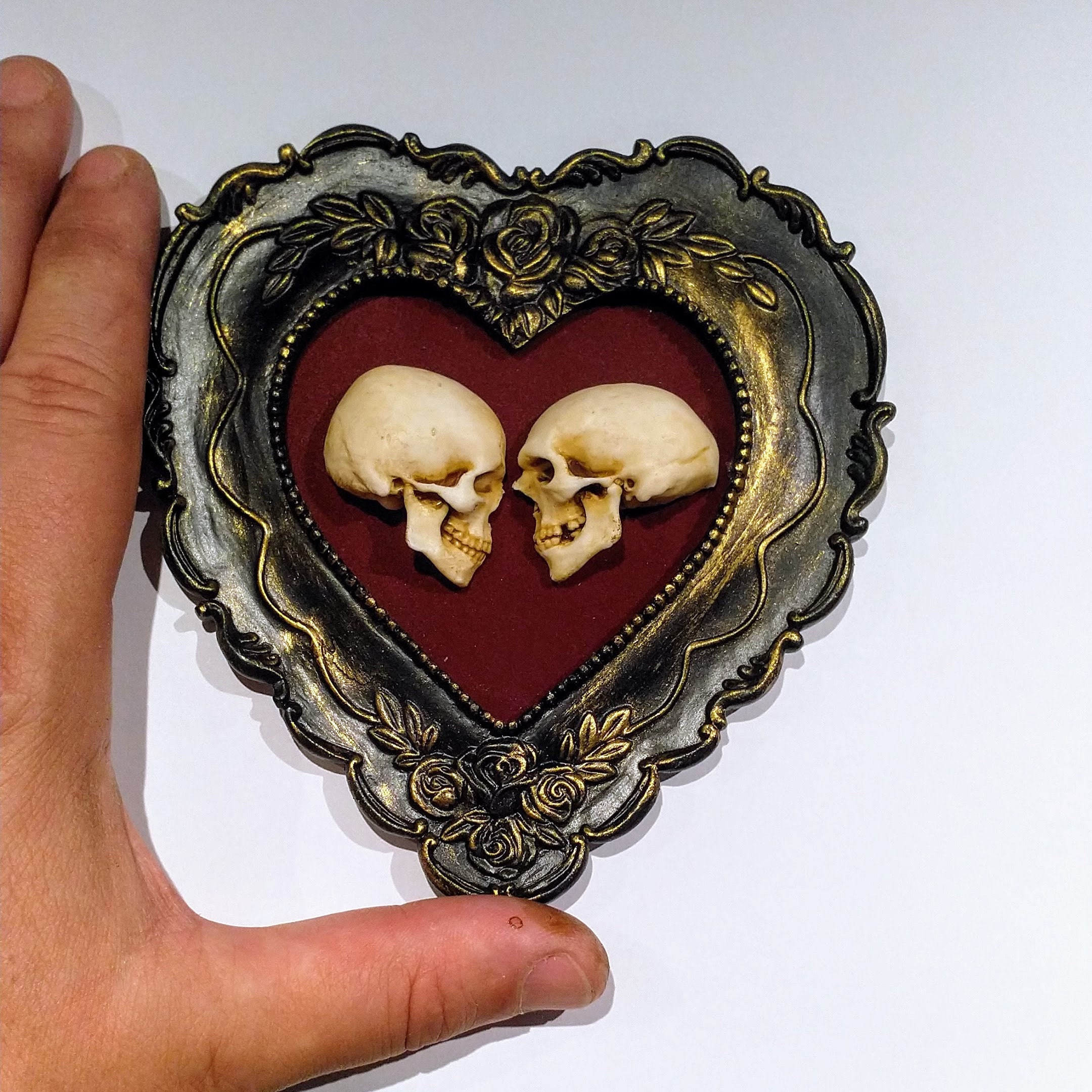 True love is forever - framed miniature realistic human skulls 
