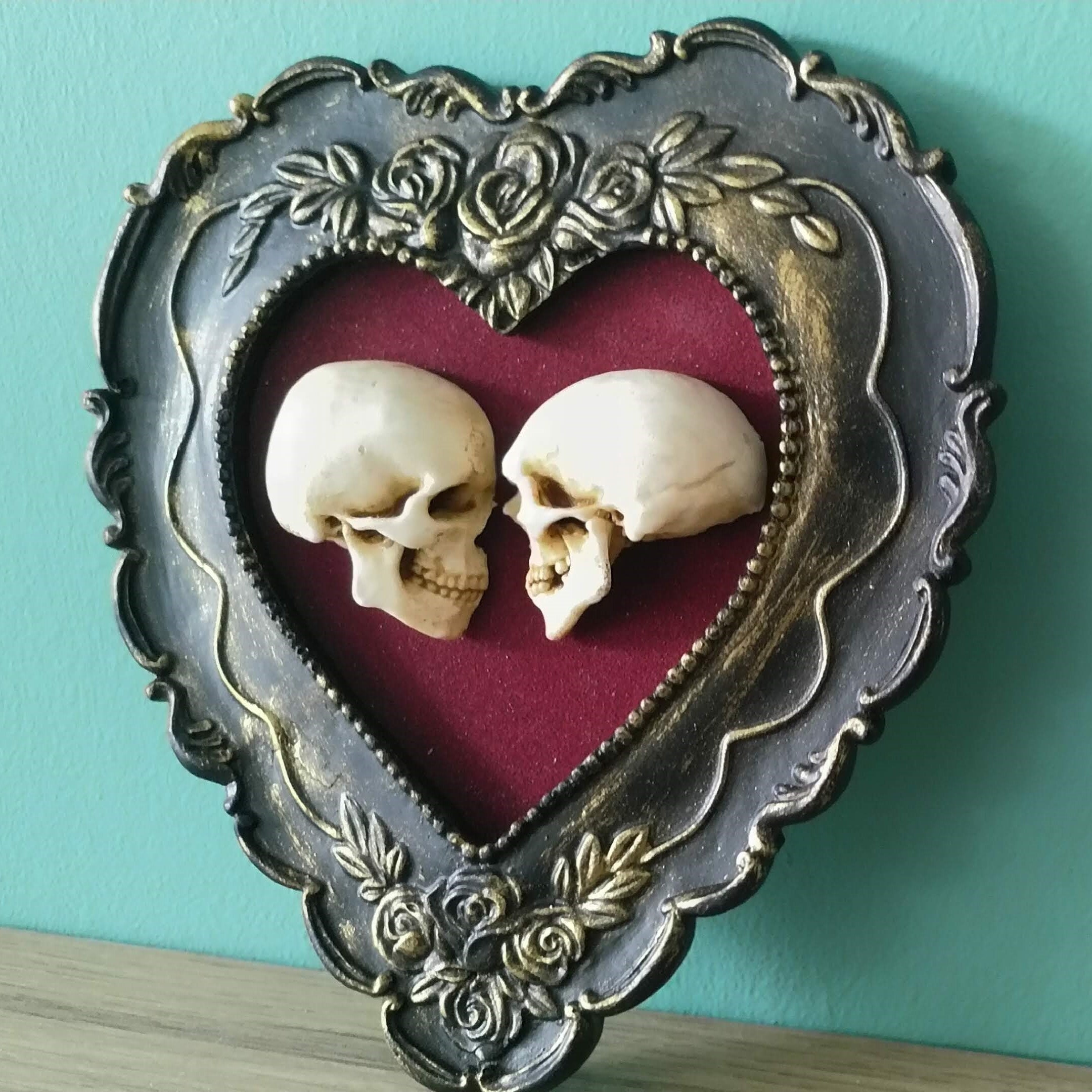 True love is forever - framed miniature realistic human skulls 