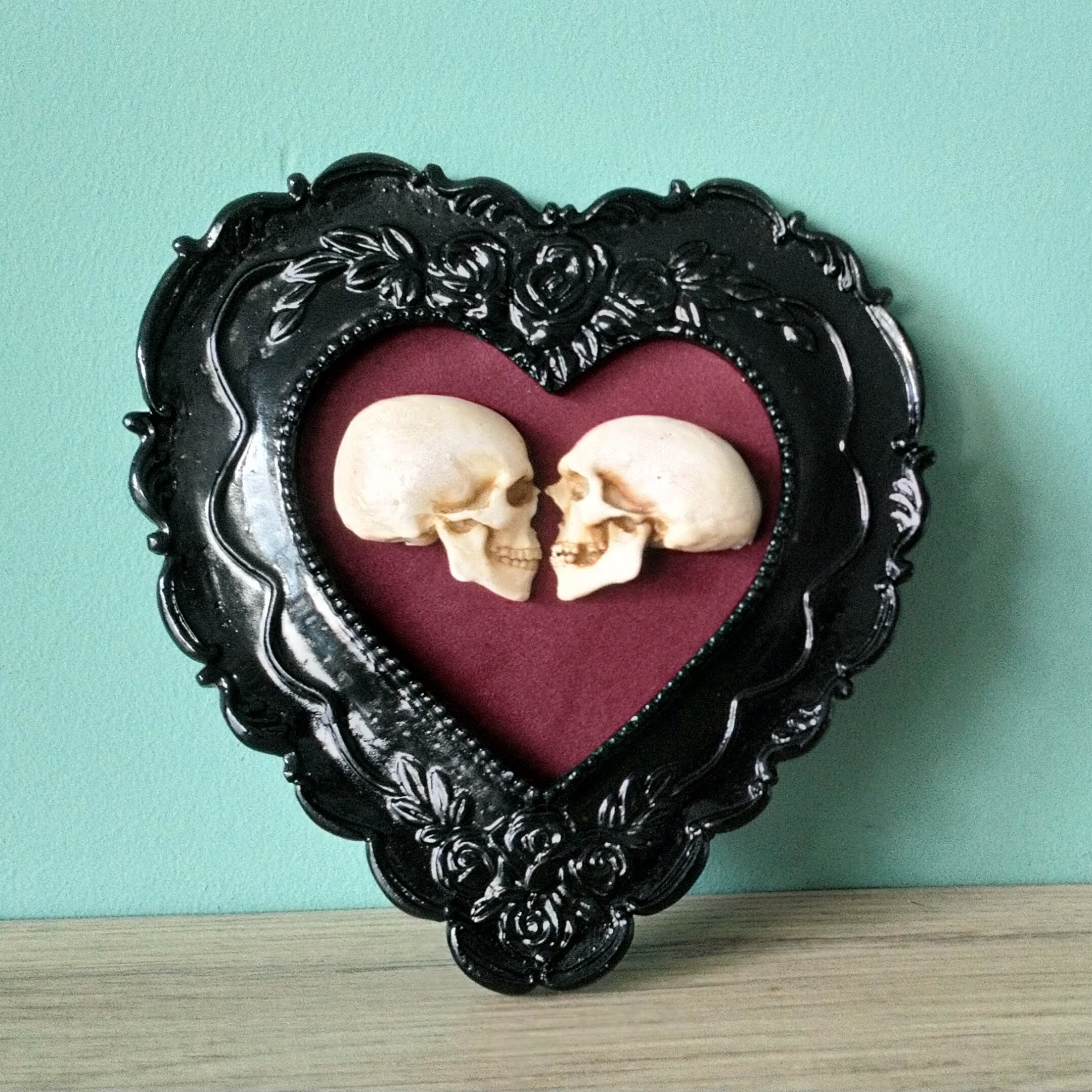 True love is forever - framed miniature realistic human skulls 