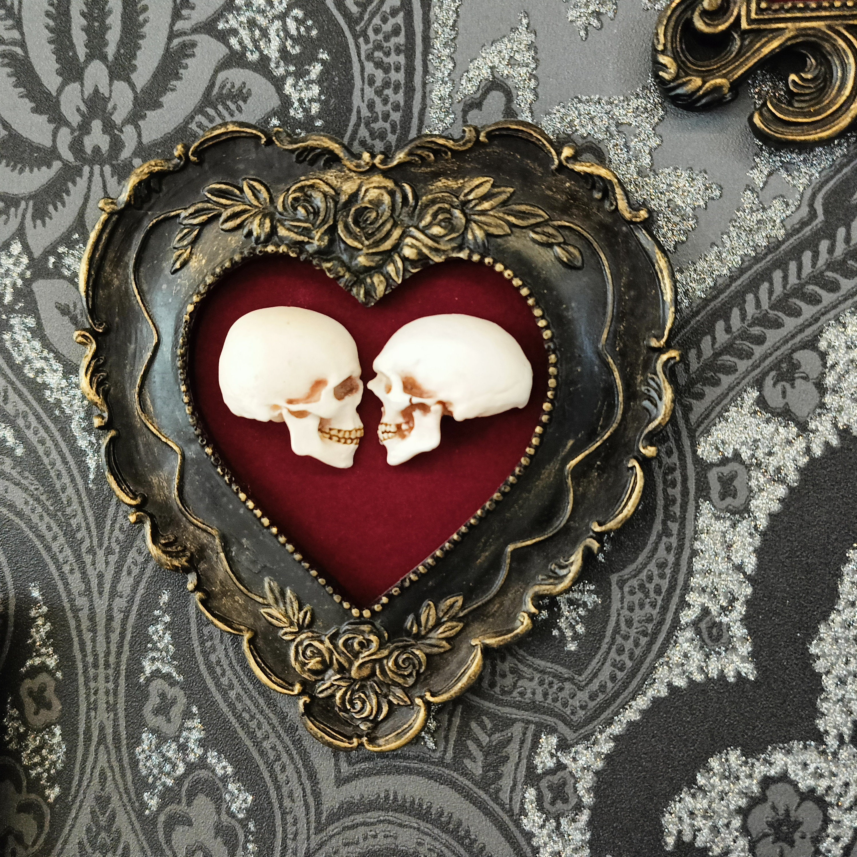 True love is forever - framed miniature realistic human skulls 