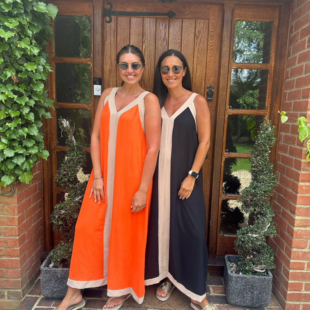 Dual-tone elegance dress! 👗