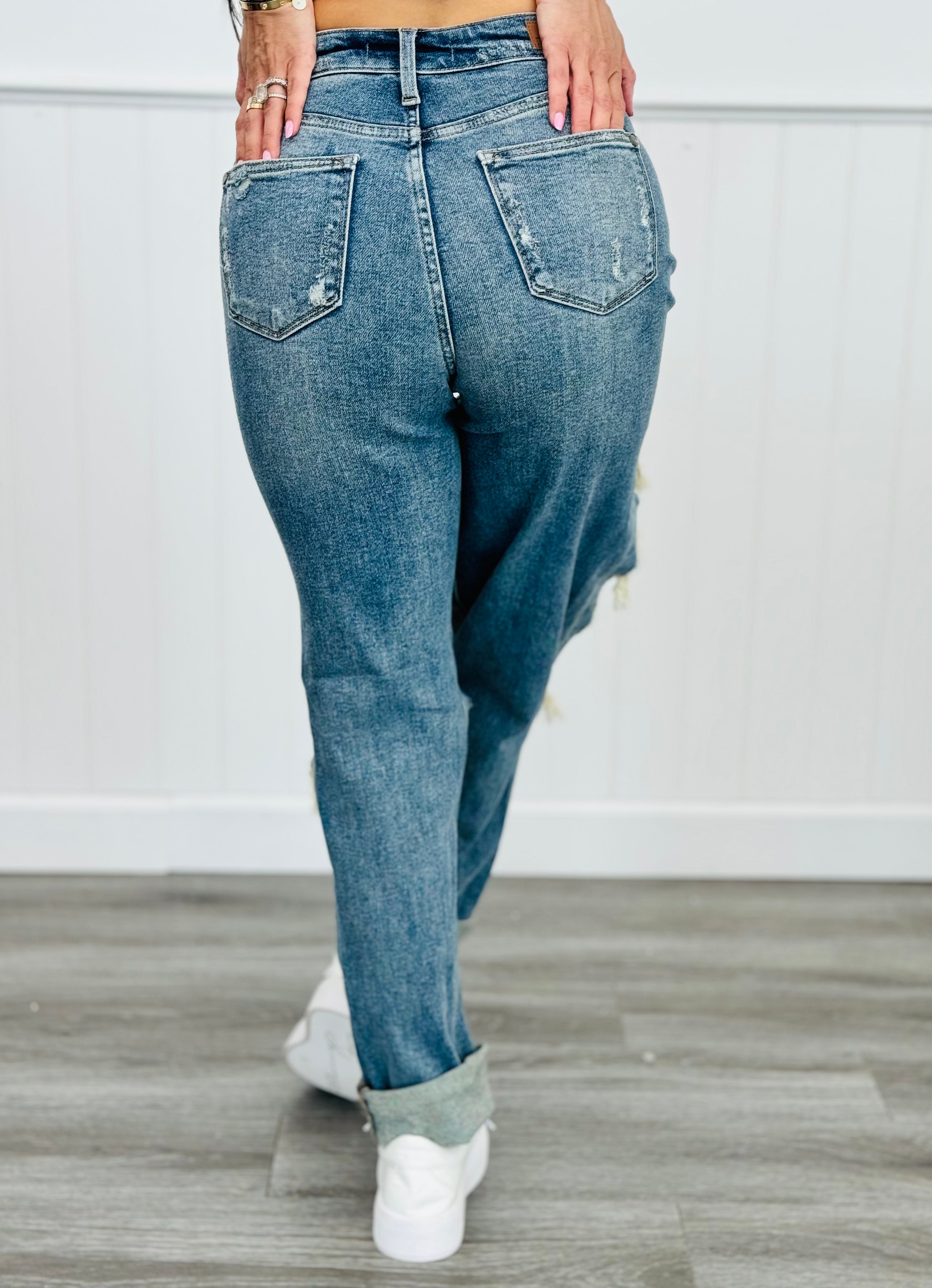Knee ripped straight jeans