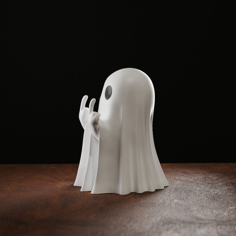 funny Ghost figurine showing the middle finger