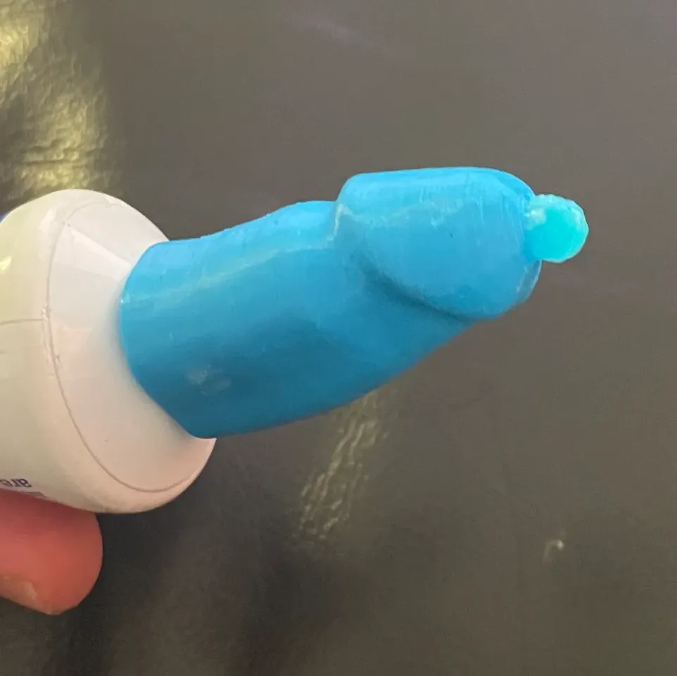 Penis shaped toothpaste dispenser