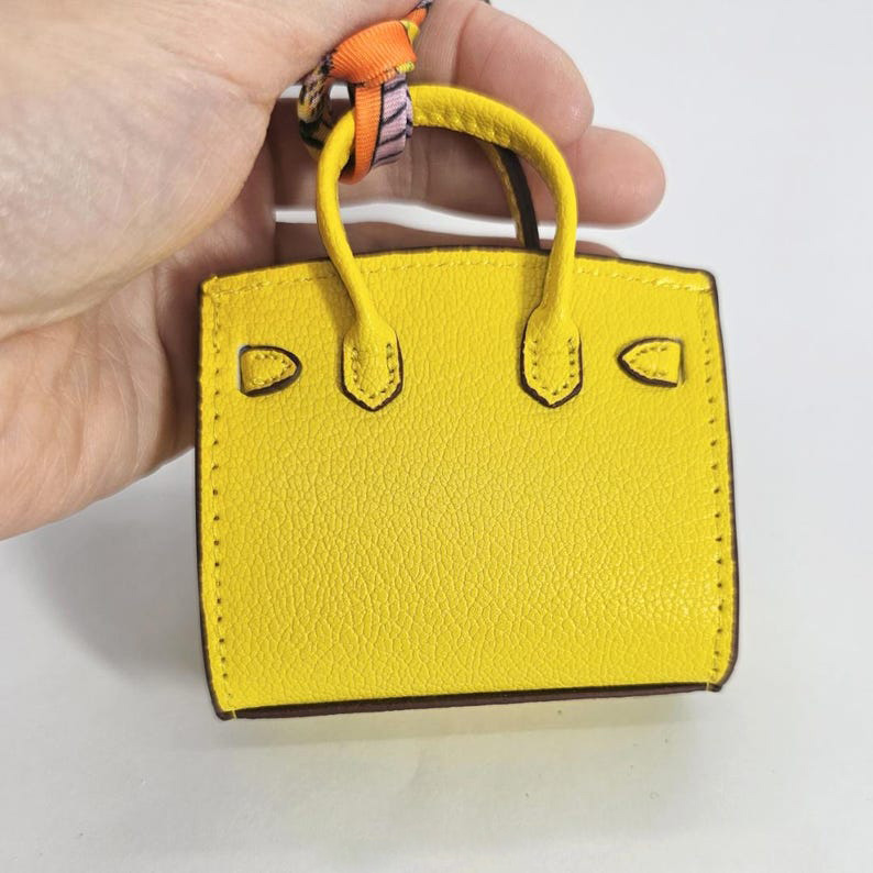 Mini handmade earphone or car key holder