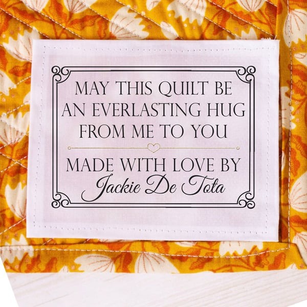 Personalized quilt labels in or Polyester with sew-on or iron on backing. Printed