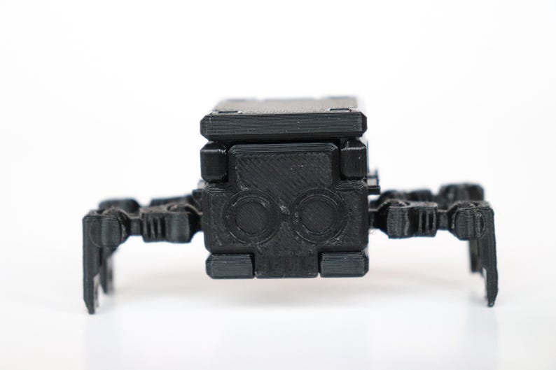 Transforming Little Cube Guy Gadget