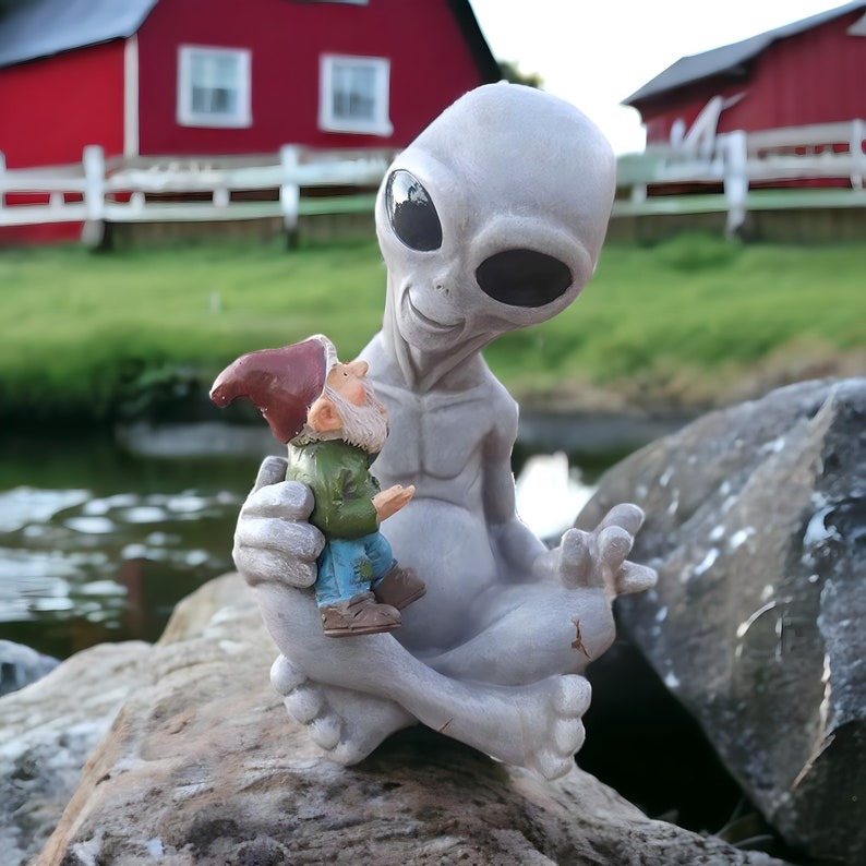 Alien Holding Dwarf Garden Statue