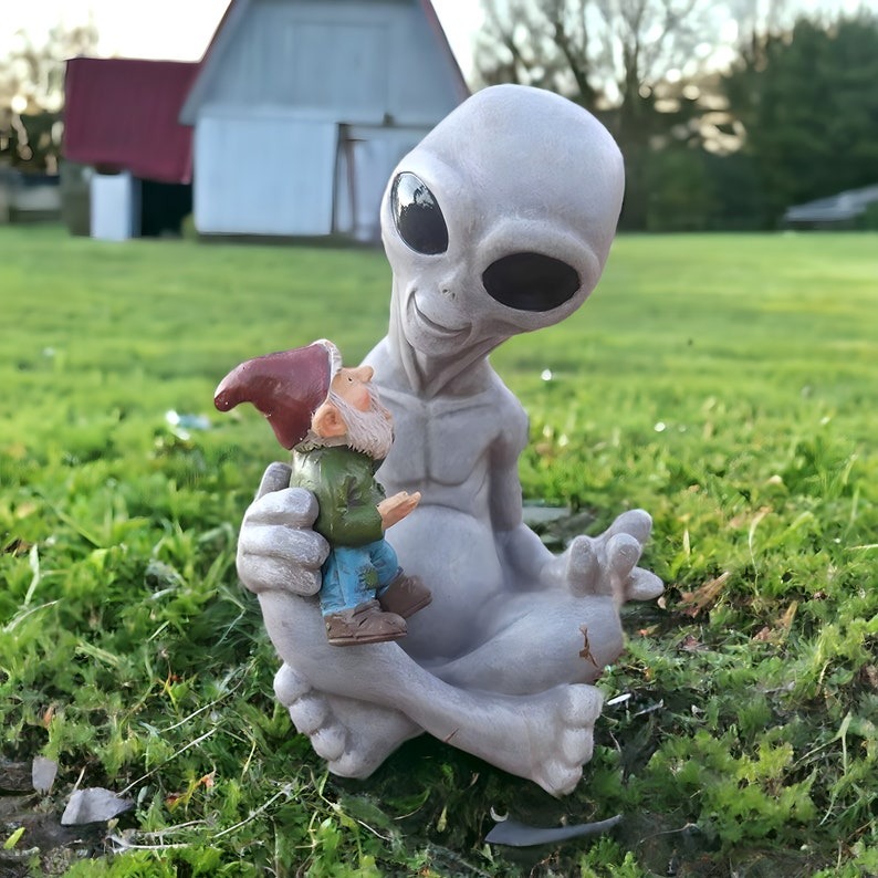 Alien Holding Dwarf Garden Statue