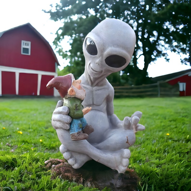 Alien Holding Dwarf Garden Statue
