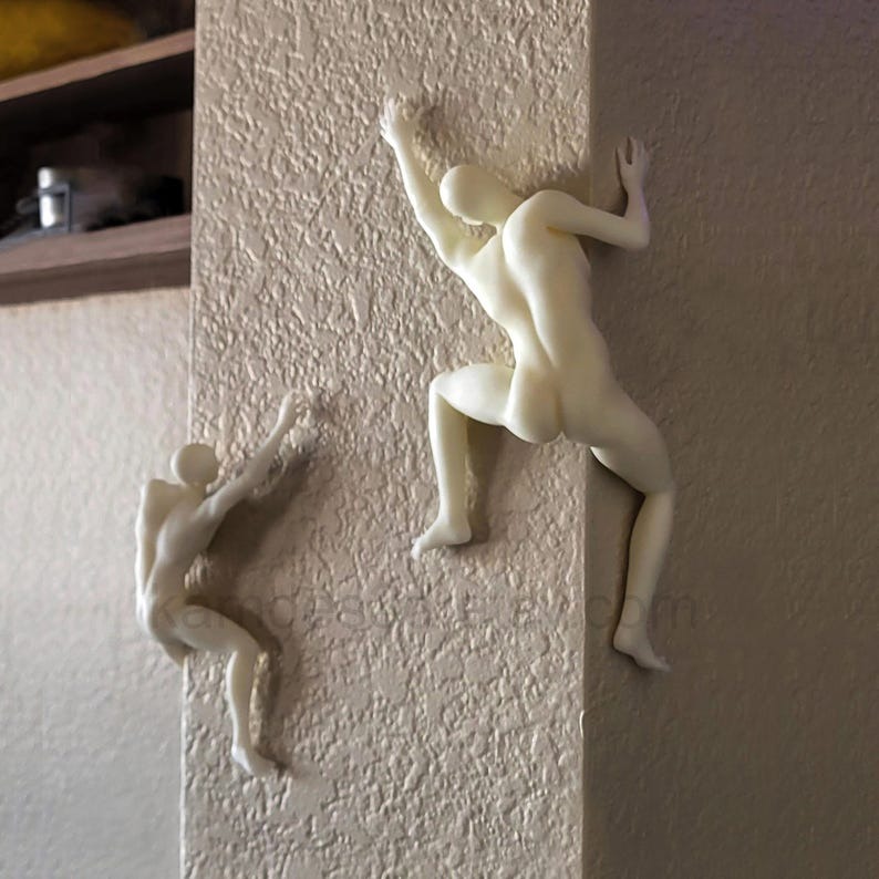 Mountain climber sculpture wall decoration