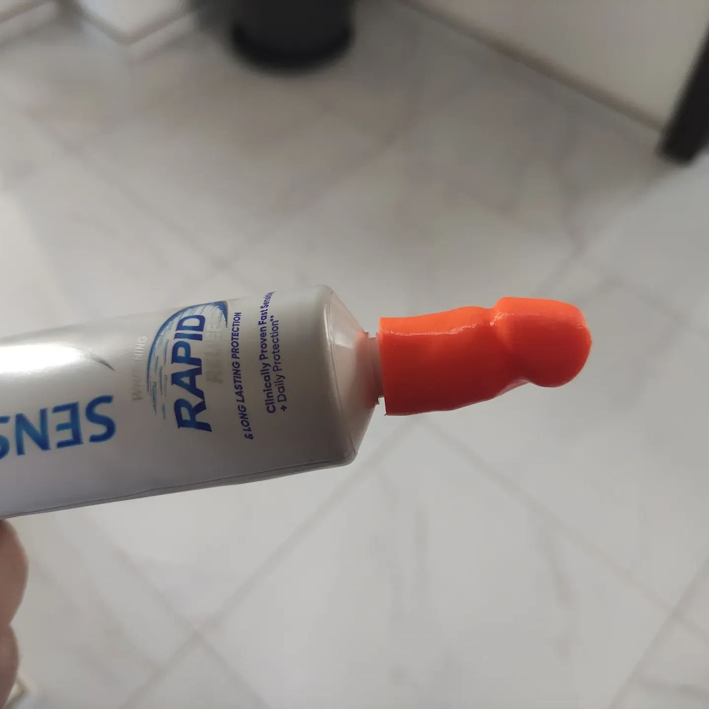 Penis shaped toothpaste dispenser