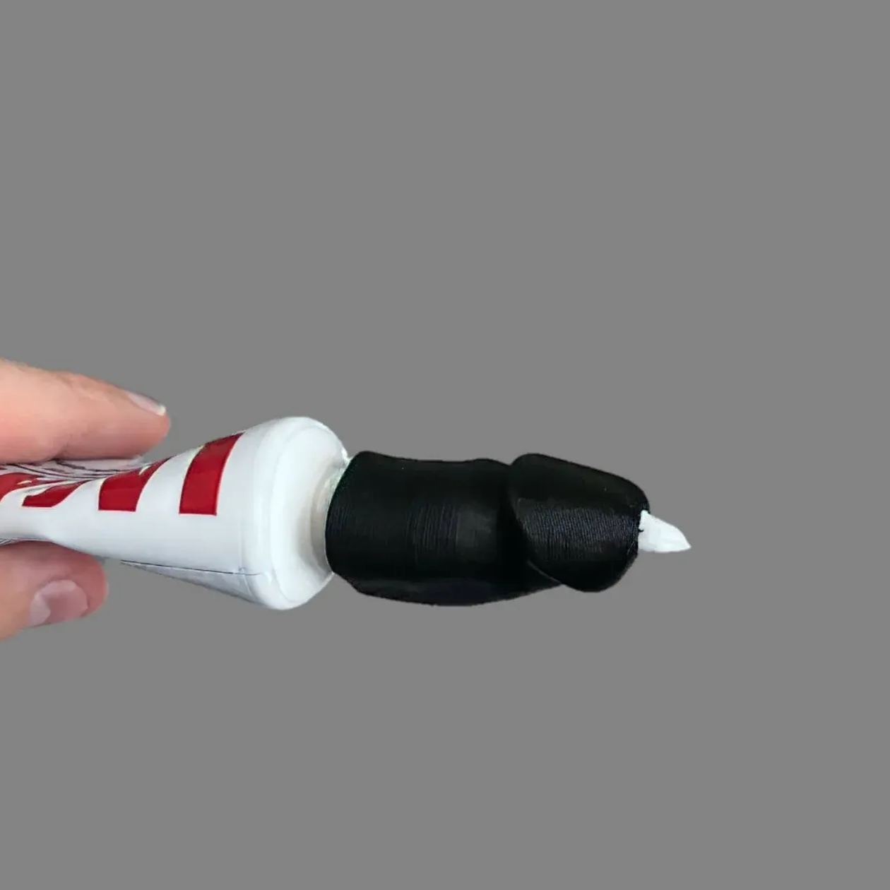 Penis shaped toothpaste dispenser