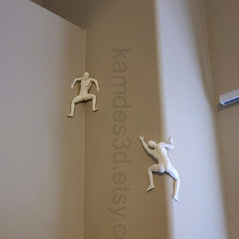 Mountain climber sculpture wall decoration