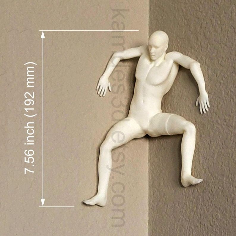 Mountain climber sculpture wall decoration