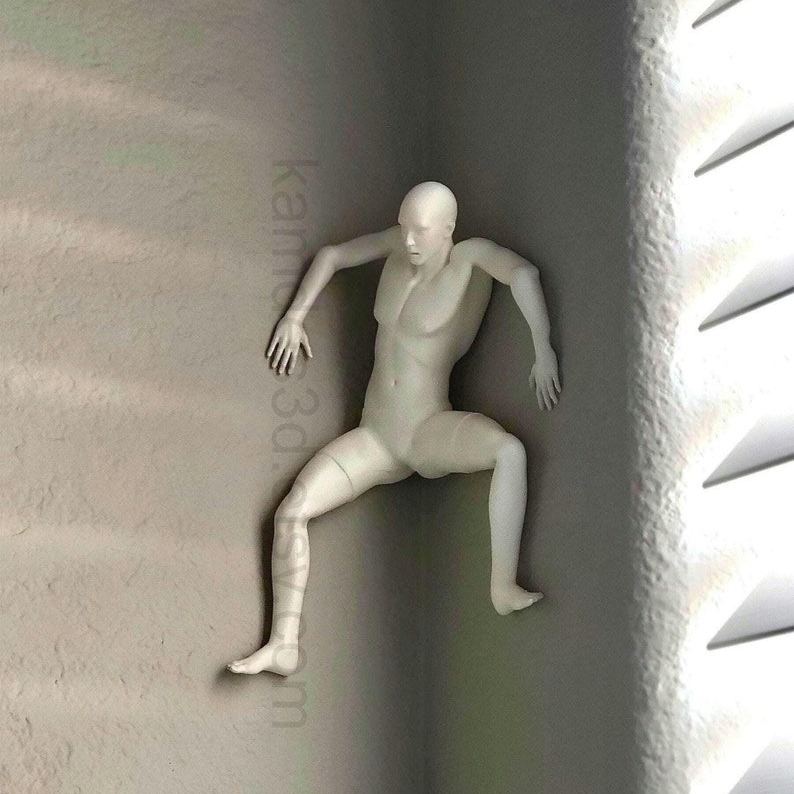 Mountain climber sculpture wall decoration