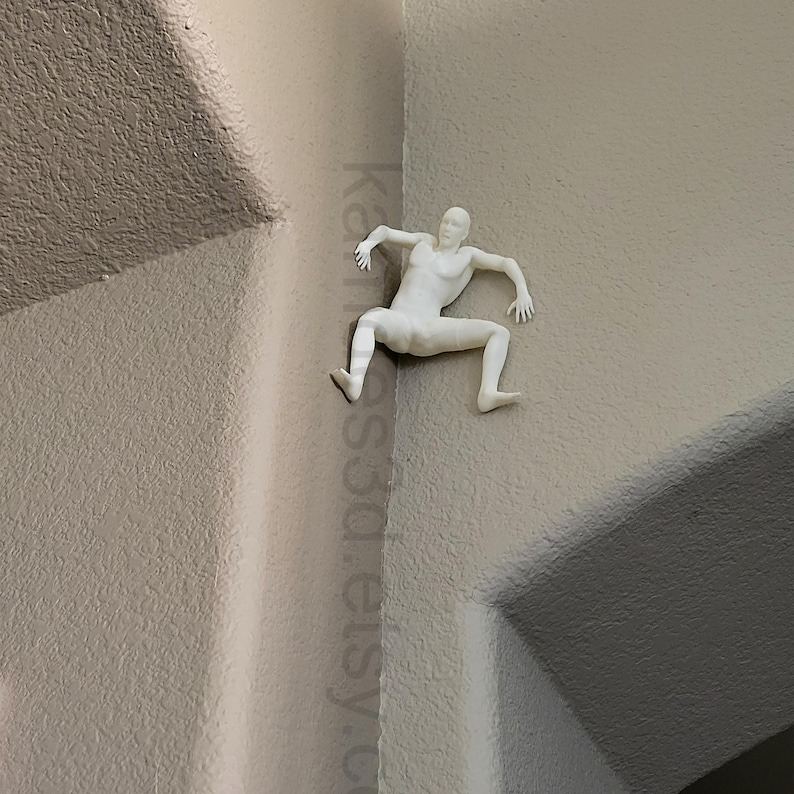 Mountain climber sculpture wall decoration