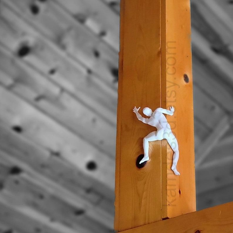 Mountain climber sculpture wall decoration