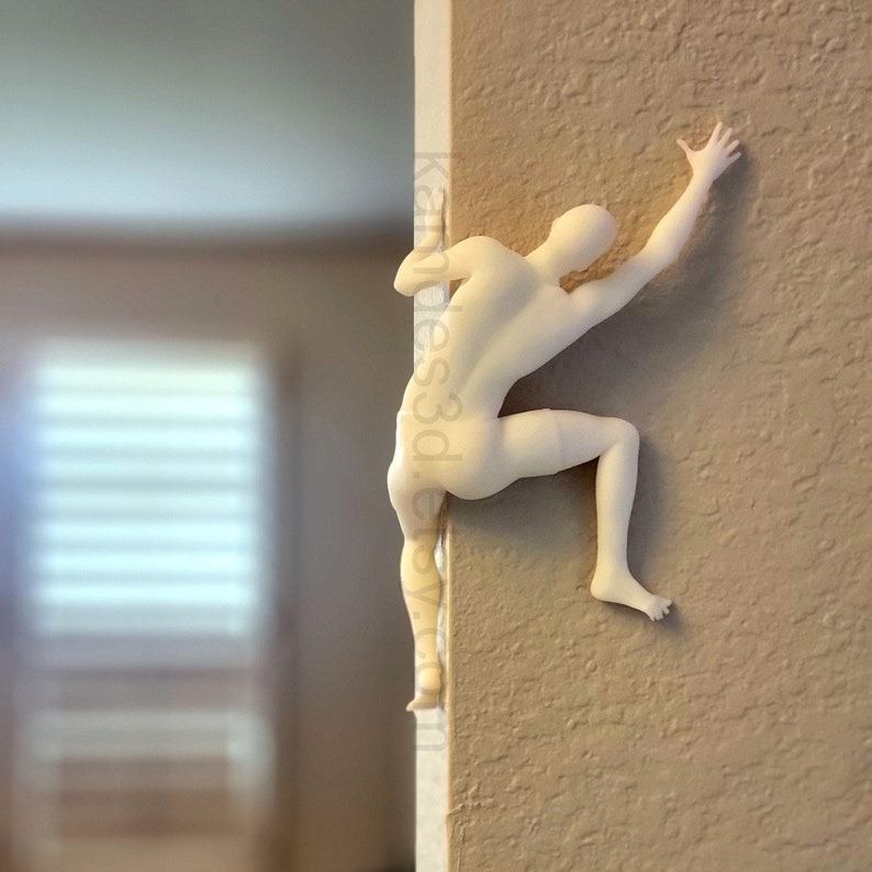 Mountain climber sculpture wall decoration
