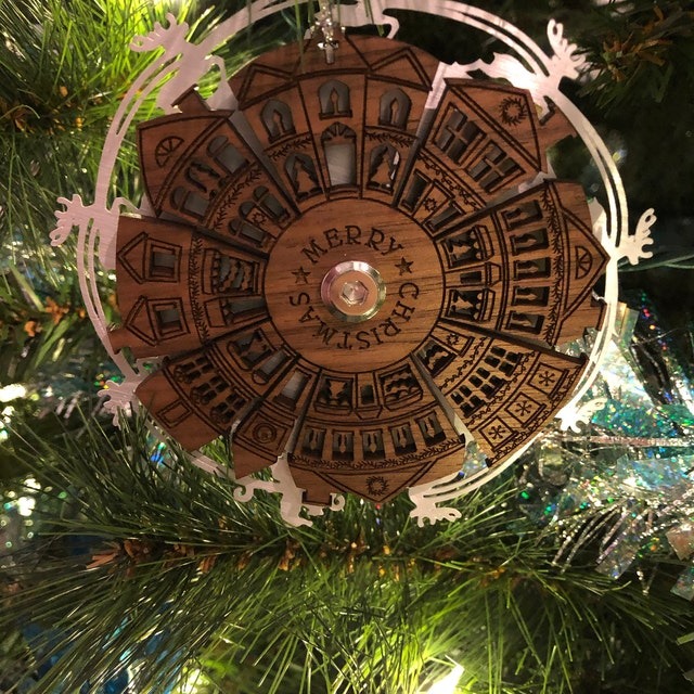 Spinning Santa Over Town Christmas Ornament