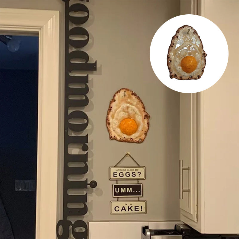 Fried Egg Hanging on a Nail