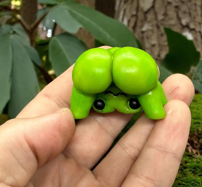 Cheeky Miniature Frog Figurine Showing Its Butt
