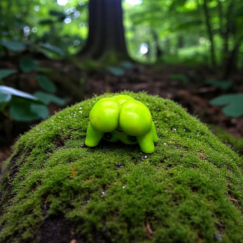 Cheeky Miniature Frog Figurine Showing Its Butt