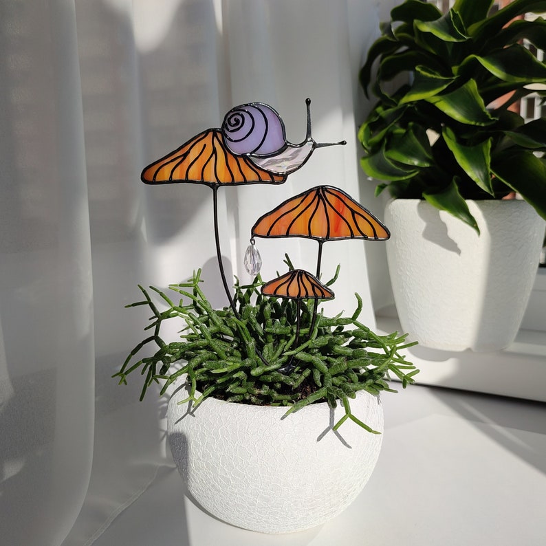 Magical Snail on Orange Mushroom Plant Stake