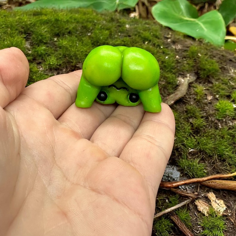 Cheeky Miniature Frog Figurine Showing Its Butt