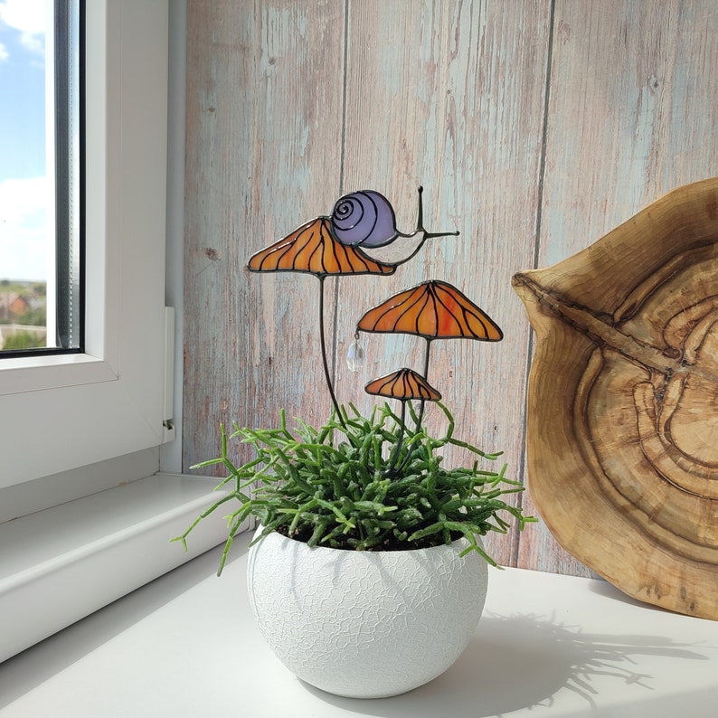 Magical Snail on Orange Mushroom Plant Stake