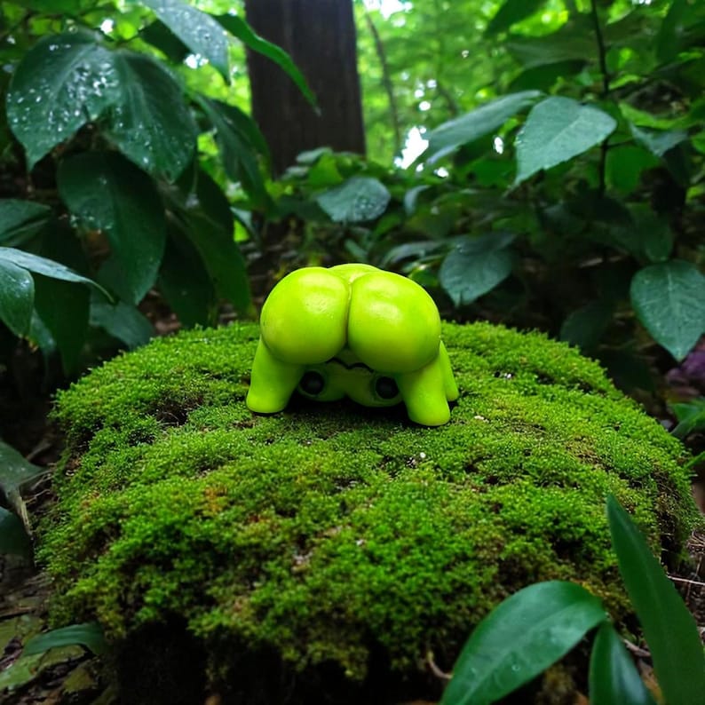 Cheeky Miniature Frog Figurine Showing Its Butt