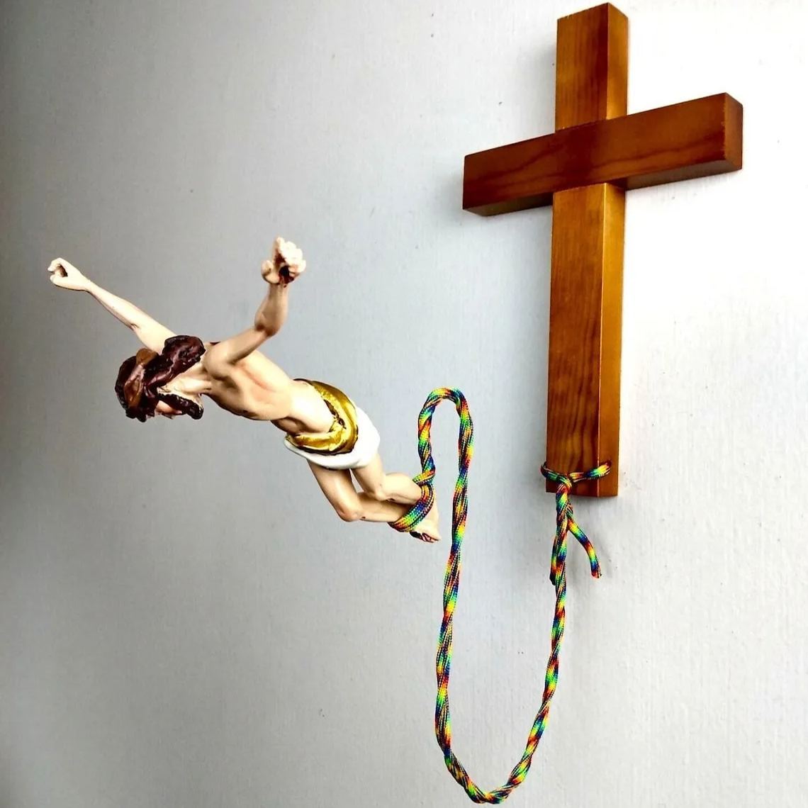 Funny Bungee Jumping Jesus with Wooden Cross