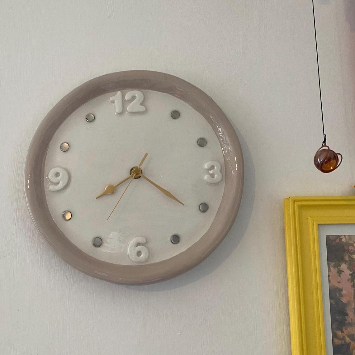 Clock with seasonal magnet charms