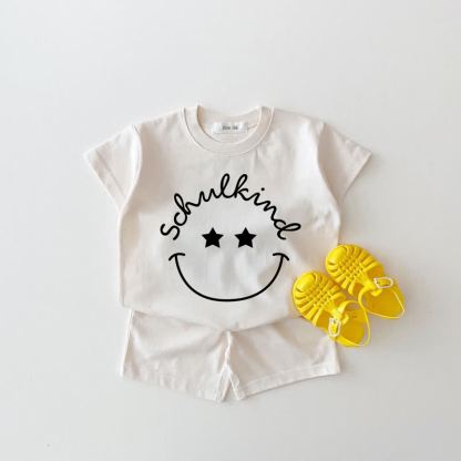 SCHULKIND Baby Weißes Smiley Gesicht T-Stück und Shorts 2-teiliges Set - Weiß - 18-24M - image 1