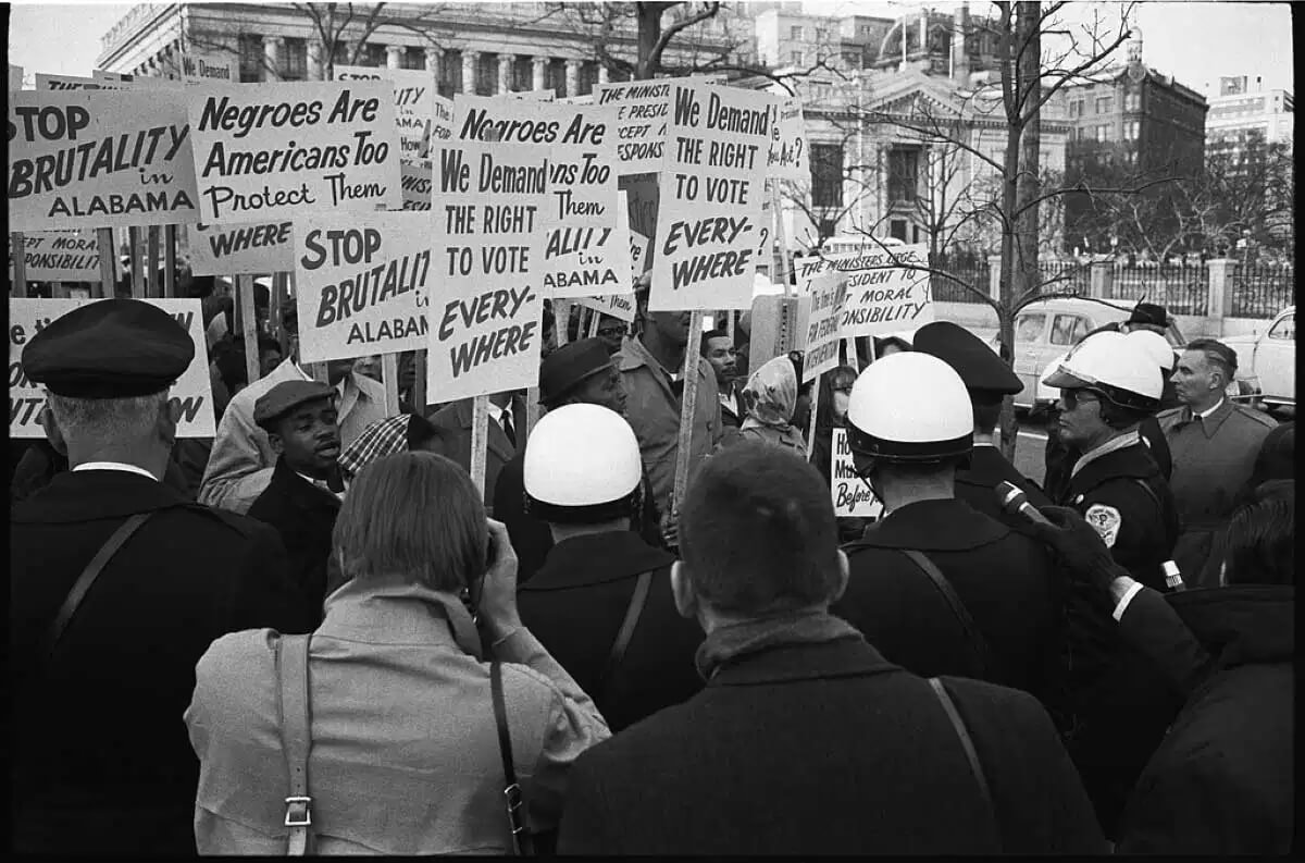 Civil rights demonstrators in Washington D.C. protesting police brutality in Alabama and voting rights by Warren K. Leffler, 1965.